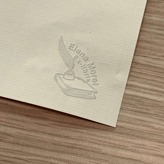 Bookplate with feather and book