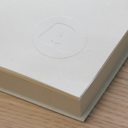 Large letter embossed stamp