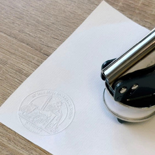 Notary embosser