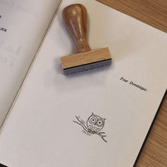 Owl on branch stamp