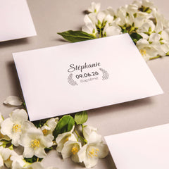 Baptism stamp with decorative leaf branch