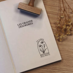 Ex-libris stamp with flowers under glass