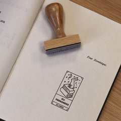 Bookplate with rabbit design on a book