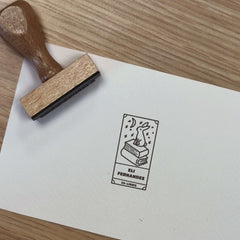 Bookplate with rabbit design on a book