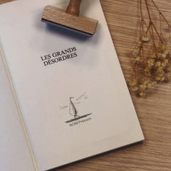 Ex-libris stamp of a small sailboat