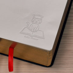 Cat bookplate on book