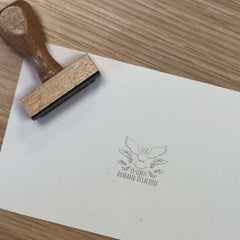 Bookplate of an owl taking flight
